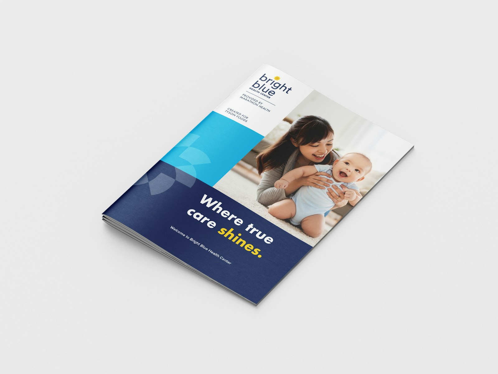 The Bright Blue brand design brochure with photo of happy mom and baby on cover.