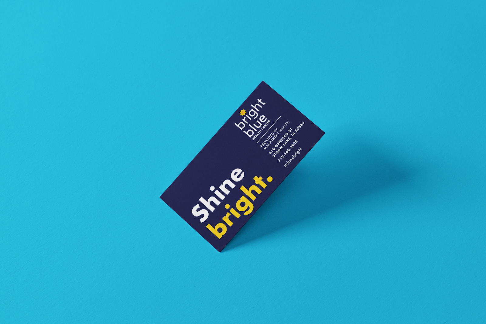 The Bright Blue brand design magnet with Shine Bright and on a blue background.