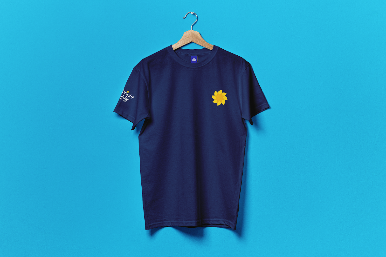 The Bright Blue brand logo design T-Shirt for employees on blue background.