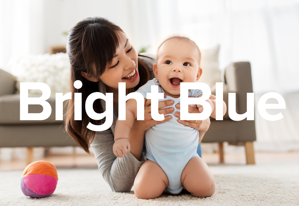 The Bright Blue brand design by Tyson Foods over a photo of mom and baby.