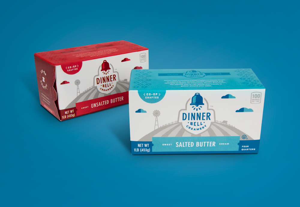 The Dinner Bell brand packaging design on two red and blue packages over a blue background.
