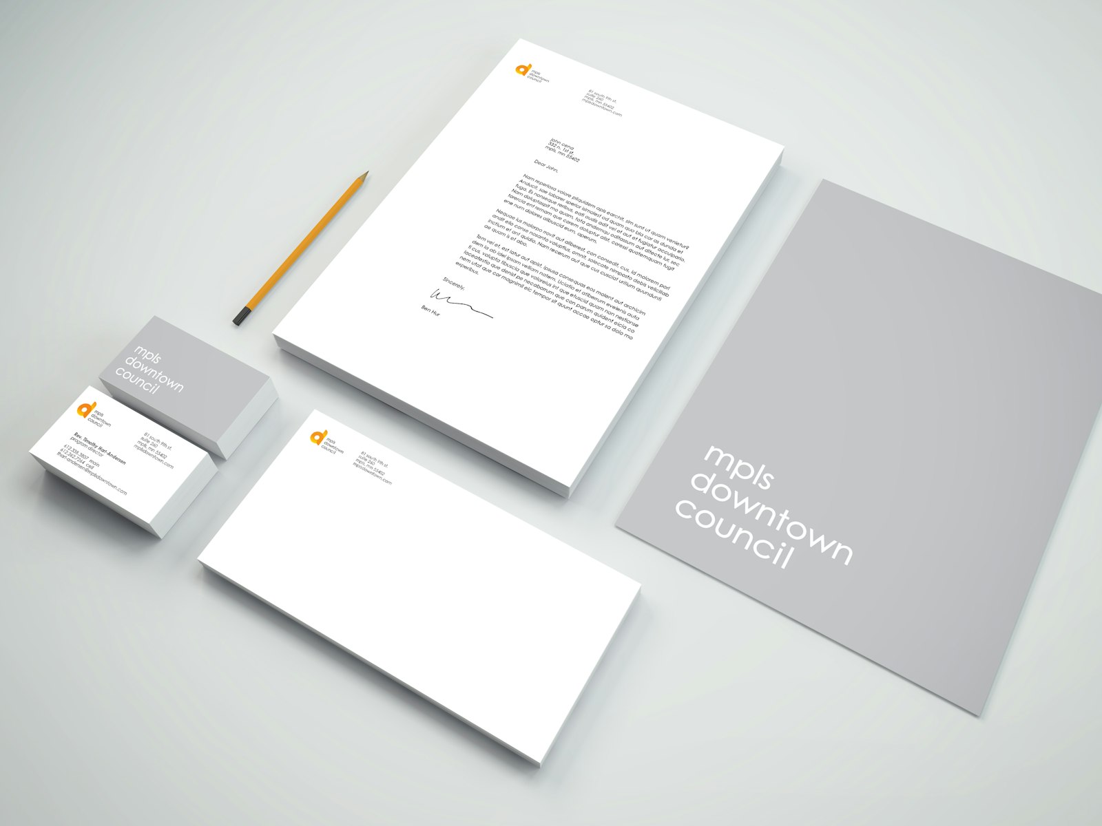 The Minneapolis Downtown Council brand design with letterhead and business cards.
