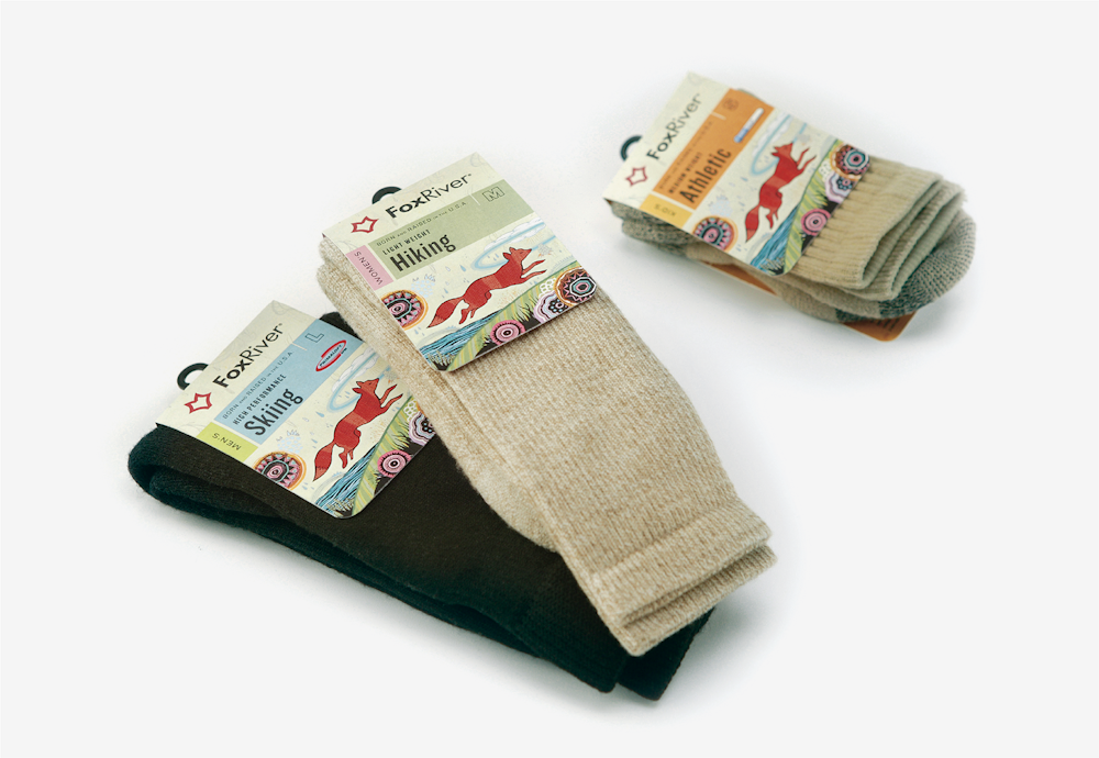 Three pairs of Fox River Socks in branded sock packaging.