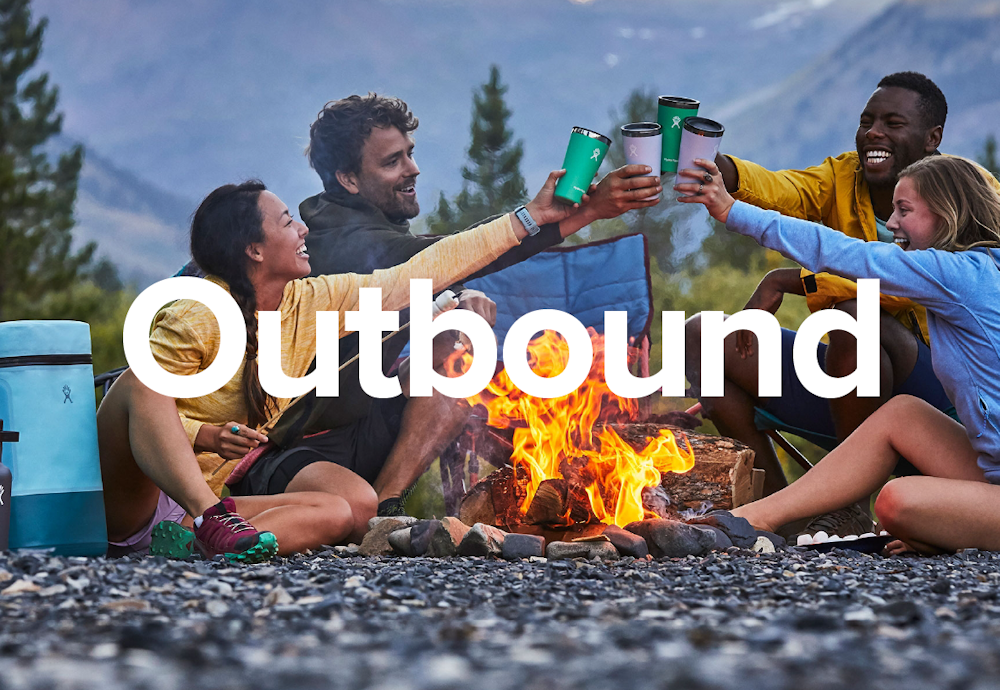 A campfire scene with people celebrating with Hydro Flask brand bottle designs.