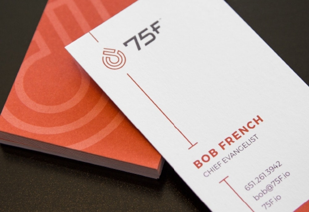 75F branding on designed business cards.