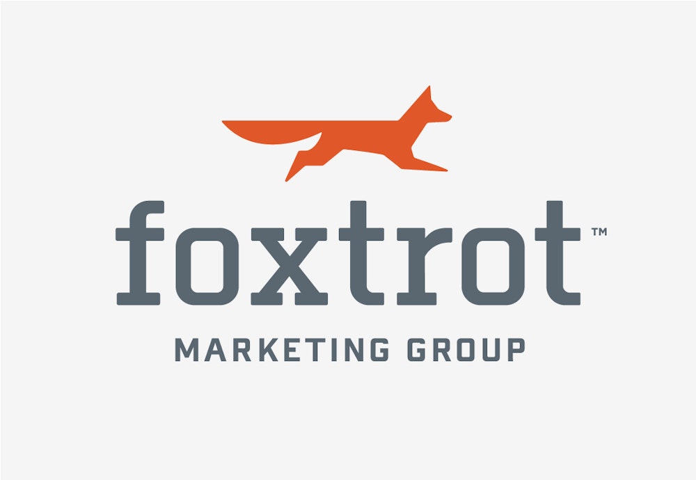 The Foxtrot Marketing Group brand design logo of fox over a white background.