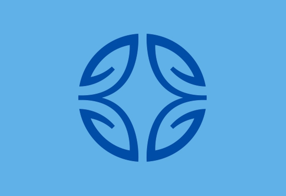 The Blue Zones by Dan Buettner brand logo mark design in dark blue on light blue background.