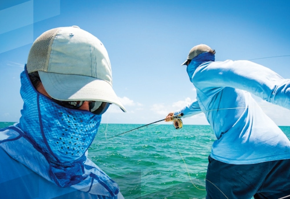 A product photoshoot for Buff showcasing two fishermen wearing Buff masks.