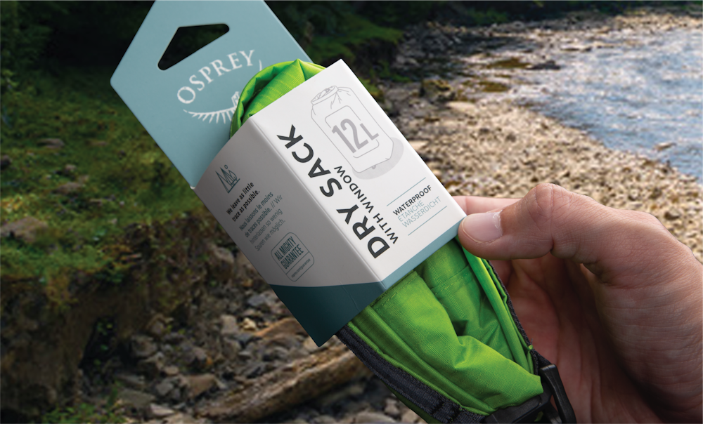 The Osprey brand design packaging for dry sack and with hand and outdoor background.