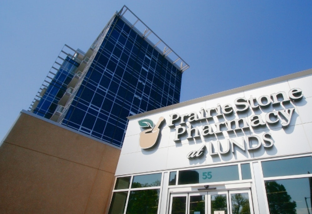 A PrairieStone retail entrance signage at Lunds with branding and logo design.