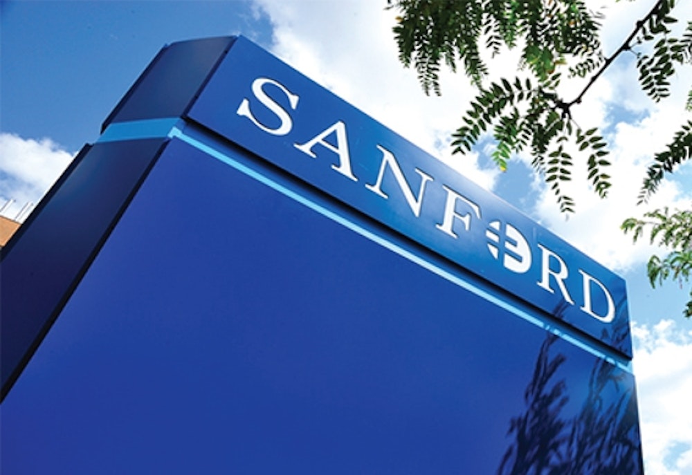 Sandford Health logo designed on building entrance signage.